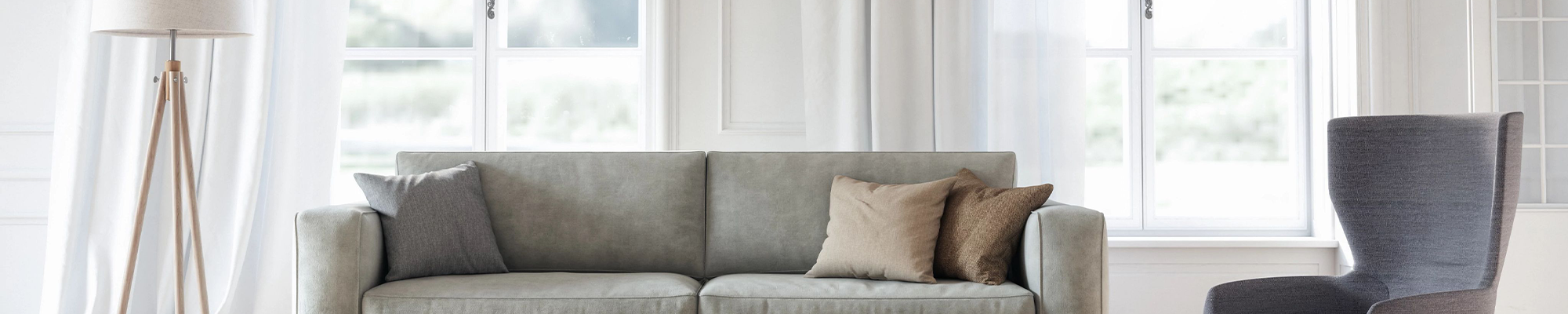 living room with couch and chairs - USA Carpets in GA